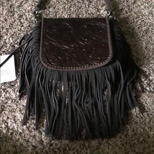 Montana west brand new with tags leather purse.